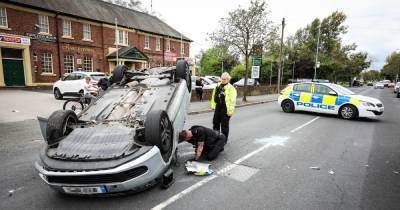 Busy road blocked in both directions after car flips during crash - www.manchestereveningnews.co.uk - Manchester - city Charlestown