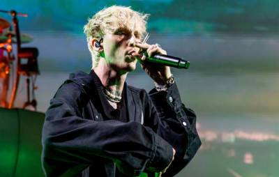 Machine Gun Kelly gets into physical confrontation with fan at Louder Than Life - www.nme.com - Kentucky