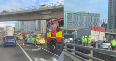 Car trapped under lorry on Kingston Bridge as elderly man treated at scene - www.dailyrecord.co.uk - Scotland - city Kingston