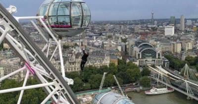 Bond lookalike performs daring stunt on London Eye ahead of film premiere - www.msn.com
