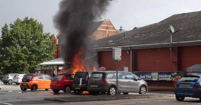 Three cars destroyed after Ford Focus bursts into flames in Asda supermarket car park - www.manchestereveningnews.co.uk
