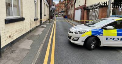 Man arrested on suspicion of murder after person found unconscious in town centre bar - www.manchestereveningnews.co.uk - city Bolton