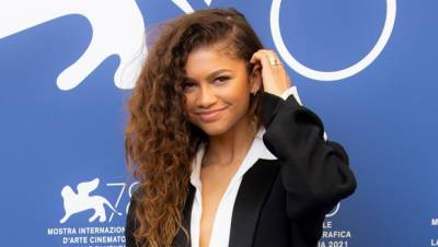 Zendaya Looks Flawless In Flowing White Dress with Pink Ribbon At Venice Film Festival - hollywoodlife.com