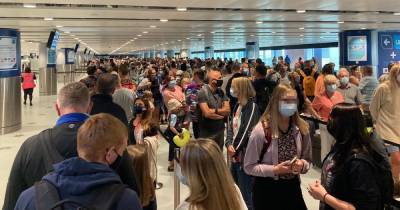 Manchester Airport responds after passengers complain of huge queues and piled-up suitcases at newly re-opened Terminal 2 - www.manchestereveningnews.co.uk - Manchester