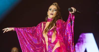 Cheryl makes a return to the stage at Mighty Hoopla in pink sparkly leotard - www.ok.co.uk
