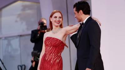 Jessica Chastain Responds to Oscar Isaac’s Red Carpet Rapture With ‘Addams Family’ Reference - thewrap.com