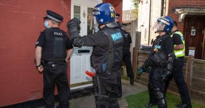 Dawn raids see two people arrested for drugs and money laundering offences in Bury - www.manchestereveningnews.co.uk