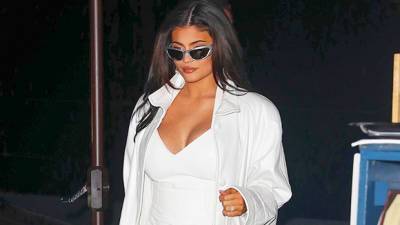 Kylie Jenner Shows Off Her Baby Bump In A Curve-Hugging White Mini Dress — Photos Video - hollywoodlife.com - New York - New York - Italy