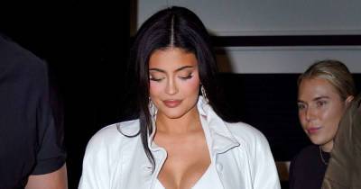 Kylie Jenner Looks Angelic In White Leather Mini Dress And Trench Coat At NYFW - www.msn.com