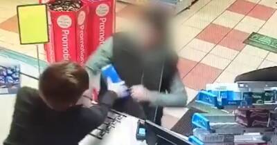 Scots thug wrenches charity tin from garage shop counter before fleeing scene with money - dailyrecord.co.uk - Scotland