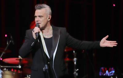 Robbie Williams says he’ll “hopefully” head out on tour in 2022 - www.nme.com - Britain - London - Las Vegas - Germany