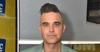 Robbie Williams claims hitman was hired to kill him at height of his career - www.ok.co.uk