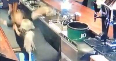 Scots barmaid plummets down open hatch in heart-stopping CCTV footage - dailyrecord.co.uk - Scotland