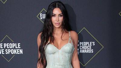 Kim Kardashian, 41, Is The Ultimate Beach Babe In Black Bikini Plunging One Piece - hollywoodlife.com