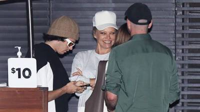 Pamela Anderson - Tommy Lee - Brandon Lee - Dan Hayhurst - Pam - Pam Anderson Is All Smiles While Out With Son Brandon Lee For Dinner After Divorce - hollywoodlife.com - California - Canada