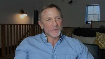Daniel Craig - Javier Bardem - Daniel Craig Starts Bleeding During Interview, Jokes 'This Is 17 Years Playing Bond' - etonline.com