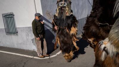 AP PHOTOS: Beast-like 'Carantoñas' return to Spanish town - abcnews.go.com - Spain