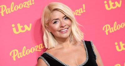 Holly Willoughby wows in black dress as she hits back at 'wacky' wellness brand comments - www.manchestereveningnews.co.uk - Australia