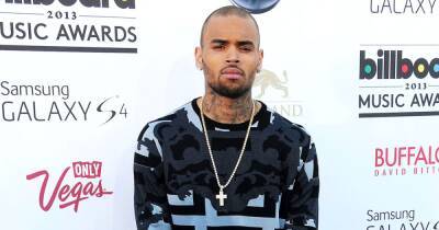 Chris Brown - Larry King - Chris Brown Sued for Allegedly Drugging and Raping Woman on Yacht - usmagazine.com - France - Paris - Miami - Virginia - George - city Mitchell