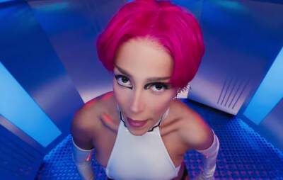 Watch Doja Cat rescue a cat from aliens in music video for ‘Get Into It (Yuh)’ - www.nme.com - London
