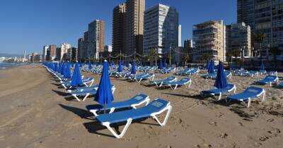 Spain keeps Covid measures in place at holiday hotspots including Tenerife and Benidorm - www.manchestereveningnews.co.uk - Britain - Spain