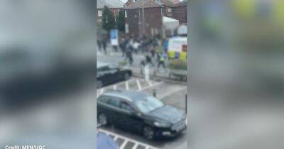 Moment violence erupts as football hooligans involved in mass brawl ahead of match - www.manchestereveningnews.co.uk - Manchester