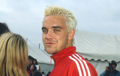 Robbie Williams says partying with Oasis at Glastonbury was “start of his new life” - www.nme.com - London