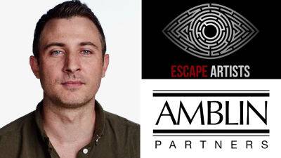 Amblin Lands Sci-Fi Pic ‘The Exchange’ From ‘Outer Range’ Creator Brian Watkins and Escape Artists - deadline.com - Washington - Wyoming