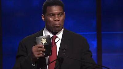 Herschel Walker Pulls Out Fake Badge When Called Out for Lying He Was a Cop During Debate (Video) - thewrap.com - county Cobb