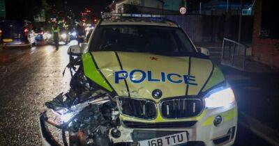 Armed response police BMW badly damaged in crash on 999 call - www.manchestereveningnews.co.uk - Manchester