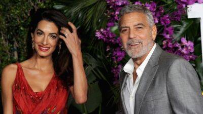 George Clooney - Julia Roberts - Kaitlyn Dever - Alexander Macqueen - Amal Clooney - George Clooney Praises Wife Amal's 'Good Taste' in Fashion (Exclusive) - etonline.com - Los Angeles - New York