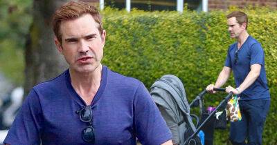 Jimmy Carr looks casual as he pushes son Rockefeller in a buggy - www.msn.com - USA