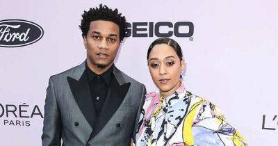 Tia Mowry flashes smile as estranged husband says he still 'loves her' - www.msn.com - Los Angeles - Hollywood - Fiji