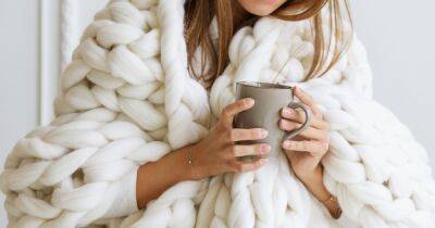 Curl Up and Get Cozy With the 11 Best Chunky Knit Blankets for Fall and Winter - www.usmagazine.com