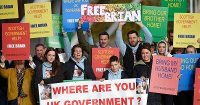 Family of Scots dad jailed in Iraq protest outside Holyrood demanding action to bring him home - dailyrecord.co.uk - Britain - Scotland - Qatar - Iraq