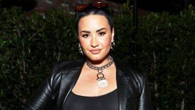 Demi Lovato - Voice - Demi Lovato Postpones 'Holy Fvck' Tour Date After Losing Her Voice - etonline.com - Chicago