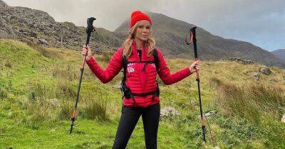 Amanda Holden climbs mountain in full make-up glam and jokes she has heels in her bag - www.ok.co.uk - Britain - Scotland - Lake - county Pike