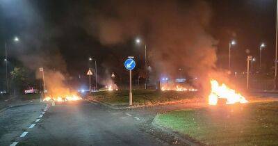 Scots youths set road on fire and toss fireworks into blaze as emergency services race to scene - www.dailyrecord.co.uk - Scotland