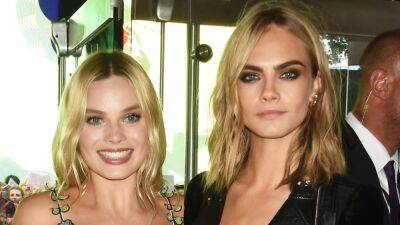 Cara Delevingne - Martin Scorsese - Margot Robbie and Cara Delevingne Had a Dangerous Encounter With Paparazzi on Vacation - glamour.com - Los Angeles - Argentina