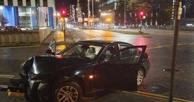BMW driver arrested in Glasgow after crashing car and failing breathalyser - www.dailyrecord.co.uk - city Glasgow