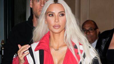 Kim Kardashian Wore the Baggiest Thigh-High Boots You've Ever Seen - glamour.com - France - Adidas