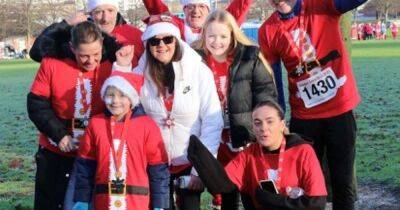 Brave six-year-old Scot fighting brain tumour completes Santa Dash as guest of honour - www.dailyrecord.co.uk - Scotland - Santa - city Santas