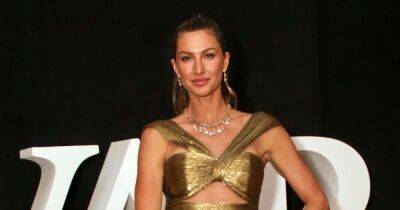 Gisele Bundchen Glitters in Gold on 1st Red Carpet After Tom Brady Divorce - www.usmagazine.com - Brazil - county Story
