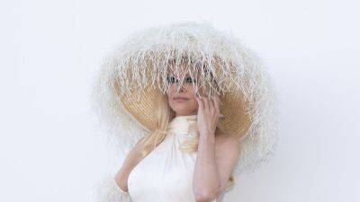 Pamela Anderson Looks Like a Greek Goddess in a Toga-Style Sheer Dress—See Pics - www.glamour.com - France - Greece