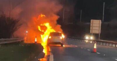 Heart-stopping moment car engulfed in flames after crash at Scots roundabout - www.dailyrecord.co.uk - Scotland