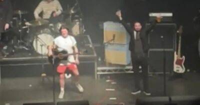 Kyle Falconer serenades Martin Compston on stage in Glasgow after missing wedding because he got arrested - www.dailyrecord.co.uk - Spain - France