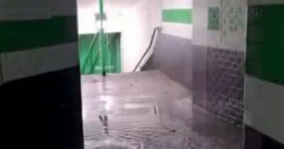 Celtic Park hit with flooding as video shows water pouring into stadium - www.dailyrecord.co.uk - Scotland - city Livingston
