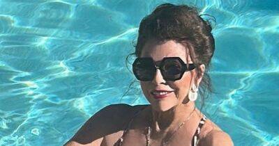 Joan Collins, 89, enjoys 'terrific' Christmas in leopard print swimsuit with husband Percy, 57 - www.dailyrecord.co.uk - France