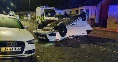 Man rushed to hospital after car flipped on its roof - www.dailyrecord.co.uk - Scotland