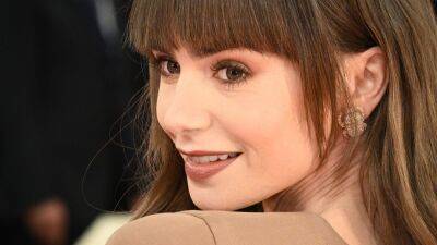 Lily Collins’s Latest French-Girl Look Is Not Very Emily—See Pics - www.glamour.com - Netflix